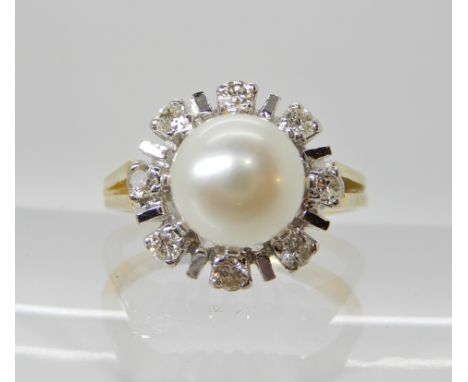 An 18ct gold pearl and diamond cluster ring of estimated approx 0.24cts, pearl approx 7.5cm, finger size L1/2, weight 6.5gms 