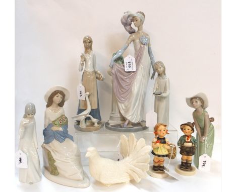 Three Lladro figures, largest 34cm high, another three Spanish figures, two Hummel figures (def) and a resin figure of a dove
