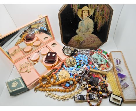 A travelling vanity case, Murano glass beads, and vintage costume jewellery Condition Report:&nbsp;Not available for this lot