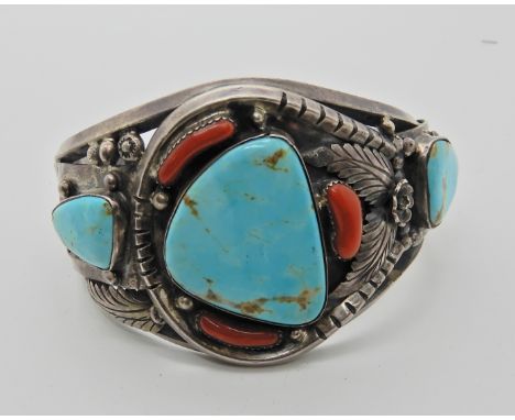 A silver American First Nation turquoise bangle maker THIT Condition Report:&nbsp;Not available for this lot.