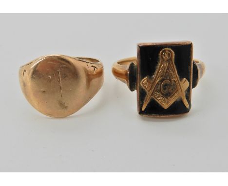 A 9ct gold and onyx Masonic signet ring size Q1/2 and a 10k gold signet ring size N1/2, weight together 9.9gms Condition Repo