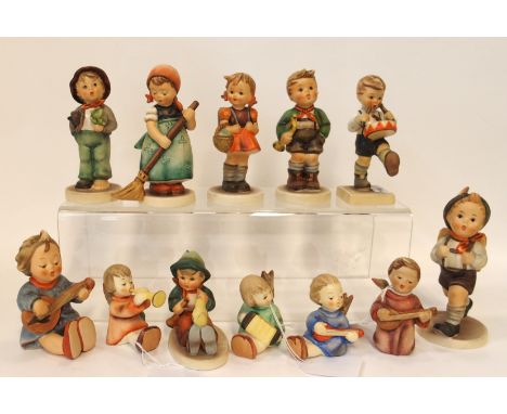 Twelve Hummel figures including Little Drummer, School Girl, little Sweeper etc Condition Report: Available upon request