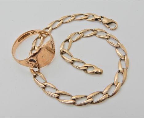 A 9ct rose gold signet ring size V, and a 9ct gold curb link bracelet length 20.5cm, weight for both 9.7gms Condition Report: