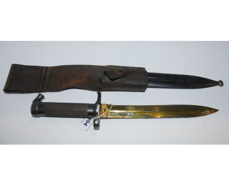 A Swedish Mauser bayonet in metal scabbard Condition Report: Available upon request