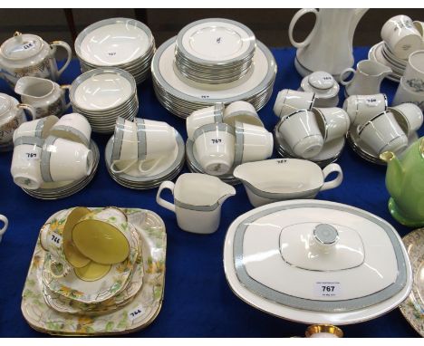 Royal Doulton 'Etude' pattern tea and dinnerwares comprising; ten tea cups, twelve saucers, twelve tea plates milk jug, veget
