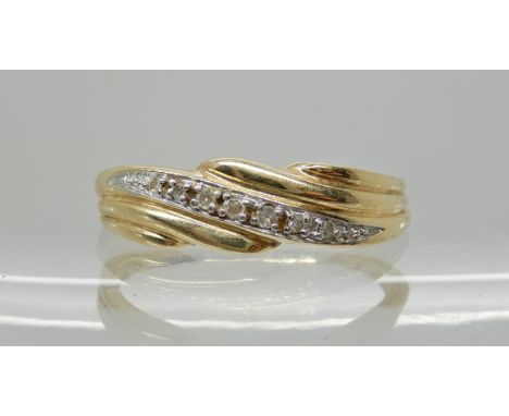 A 14k gold and diamond accent dress ring, size T, weight 2.7gms Condition Report: Available upon request