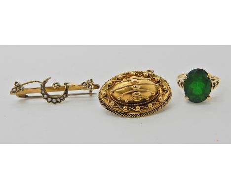 A yellow metal Victorian balloon brooch 2.8cm x 2cm, a 9ct ring set with a green glass gem, size L1/2, and a 9ct gold pearl s