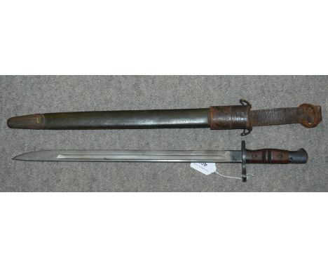 An American bayonet, the blade stamped Remington, 1917 in leather scabbard Condition Report: Available upon request
