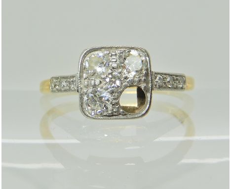 An 18ct gold vintage diamond cluster, (one diamond missing) estimated approx diamond content of remaining diamonds 0.38cts, f