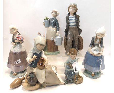 Three Lladro figures of Dutch girls, another of a girl painting pots (one pot loose), a Lladro boy and a Nao boy (6) Conditio