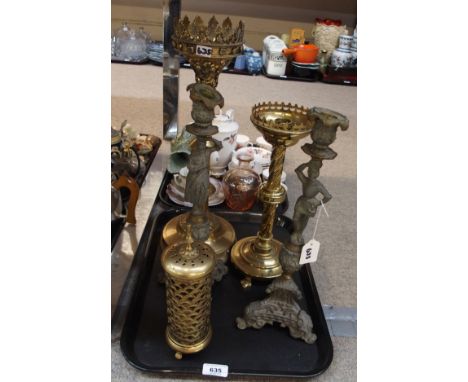 A brass ecclesiastical candlestick, another smaller etc Condition Report: Available upon request