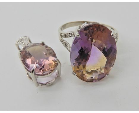 A 9ct white gold ametrine and diamond dress ring size Q1/2, with a matching pendant length 2.3cm, weight for both 7.4gms Cond