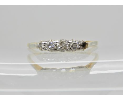An 18ct gold five stone diamond ring (one diamond missing) estimated approx diamond content of remaining diamonds 0.13cts, fi