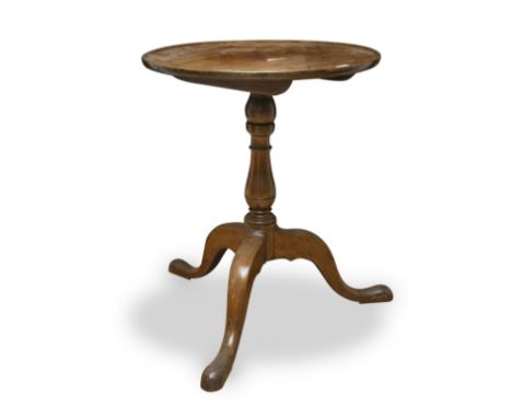 A GEORGIAN MAHOGANY TABLE, on tripod base, the top associated