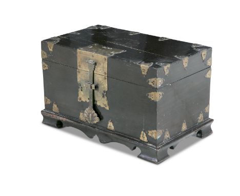 A CHINESE EBONISED AND BRASS STRONG CHEST, of rectangular form, the hinged lid opening to reveal a two-tiered interior, the l