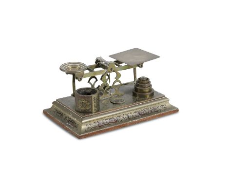 A 19TH CENTURY BOULLE RECTANGULAR POSTAL SCALES, WITH A SET OF WEIGHTS, engraved with postal rate guidelines. 12cm high, 26cm