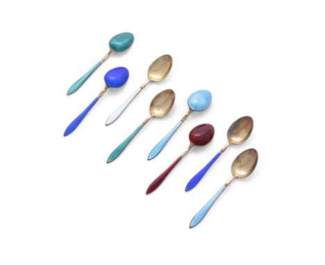 A SET OF EIGHT DANISH SILVER GILT AND COLOURED ENAMEL COFFEE SPOONS