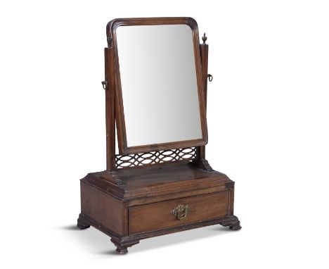 A GEORGEIII TOILET MIRROR, with adjustable rectangular plate between squared upright supports over a single frieze drawer and