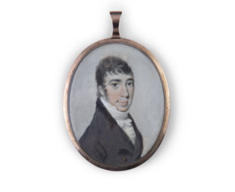 MANNER OF F. BUCK (c.1820)Miniature portrait of a young man in grey coat Watercolour on ivory, 6 x 5cmWith plaited hair on re