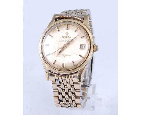 A gents Omega Constellation gold plated automatic chronometer officially certified wrist watch having signed champagne dial (