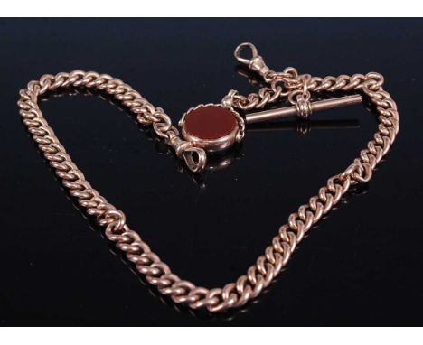 A 9ct gold hollow curblink watch chain with T bar and bloodstone agate set swivel fob pendant, 23g, length 38cm 