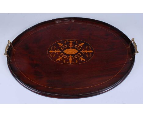 An Edwardian mahogany and marquetry inlaid gallery drinks tray, of oval form with Arabesque influenced central panel and end 