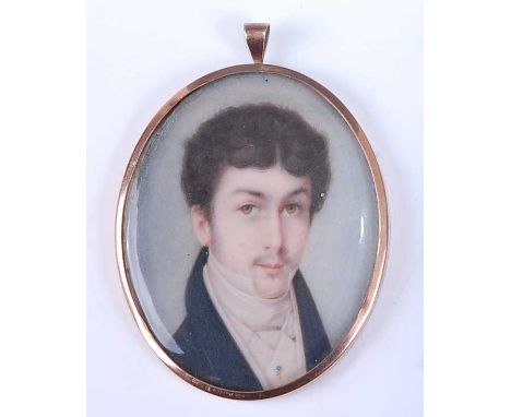 19th century English school, half length portrait of young man wearing a black tunic and tiepin, miniature on ivory, framed a