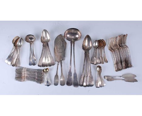 An extensive silver part cutlery suite in the Fiddle pattern, principally Edinburgh circa 1820-1830, but some with London ass