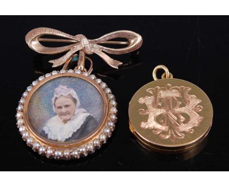 A yellow metal painted miniature portrait pendant, featuring a young woman to one side and an older lady to the other, within