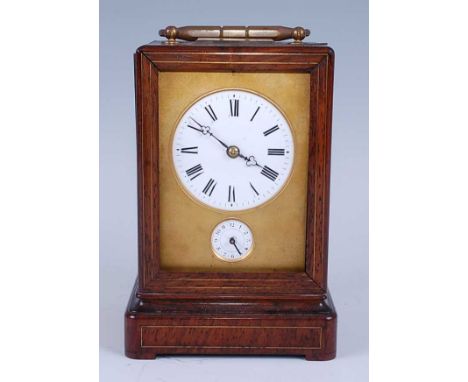 A mid-19th century French rosewood and lacquered brass cased carriage clock, the case having brass stringing, swing carry han