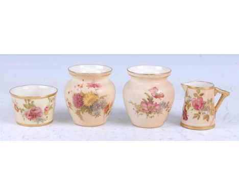 A pair of 1900 Royal Worcester blushware small vases, each hand-painted with flowers upon a blush ivory ground, green printed