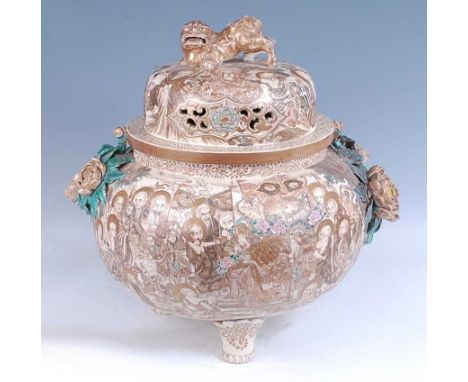 A Japanese Meiji period Satsuma earthenware koro of good size, the lid surmounted by a shisa and bearing impressed mark for K