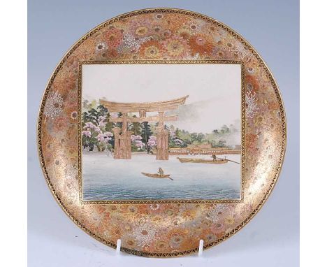 A Japanese Meiji period Satsuma earthenware plate, the central square panel decorated with boats before a torii within a gilt
