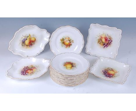 A 1917 Royal Worcester porcelain dessert service, each piece hand painted with fruit and signed by Frank Roberts, on a white 