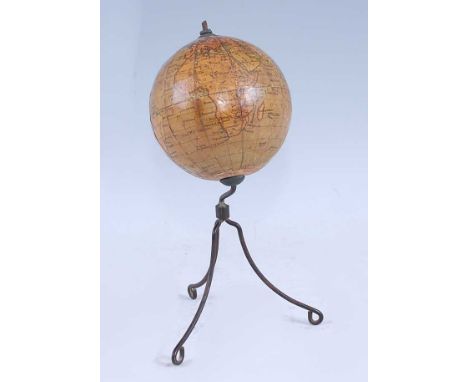 A Phillips three inch terrestrial globe, the twelve engraved gores with contemporary outline colouring, mounted perpendicular