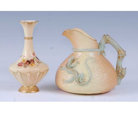 A 1915 Royal Worcester blush ivory ewer, relief decorated a lizard to the basket weave body, the handle in the form of antler