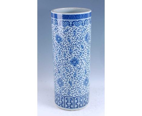 A 19th century Chinese blue and white porcelain stick stand, decorated with a ruyi head border above flowers, 61cm highCondit