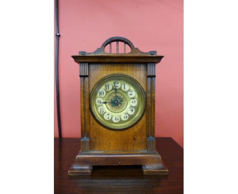 A German Jungenstil walnut mantel clock