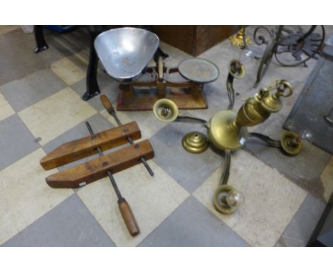 A set of shop scales, vintage clamp and brass chandelier