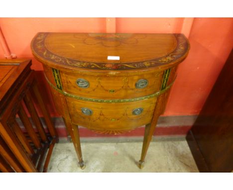 A Sheraton Revival painted satinwood petit demi lune commode