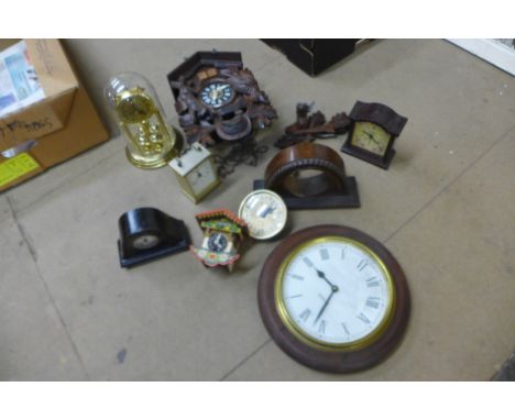 A box of clocks including a cuckoo clock