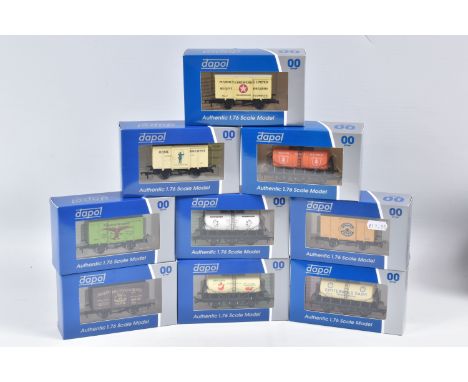 NINE BOXED OO GAUGE DAPOL WESSEX RAILWAY WAGONS AND TANKS, to include a Joseph Brutton &amp; Sons no. 23, a South Coast Dairi