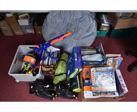 A LARGE QUANTITY OF BOARD GAMES, CAMPING GEAR, COMBAT TOYS ETC, to include a selection of Nerf guns and missiles, in an AF co