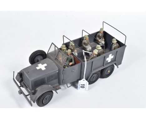 A BRASS KIT BUILT MODEL OF A WWII GERMAN ARMY LORRY, has been constructed and finished to a good standard, one wheel is loose