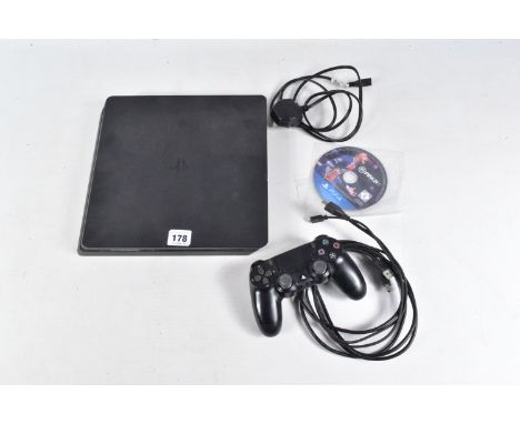 A PLAYSTATION 4 SLIM CONSOLE AND CONTROLLER, console is notably dirty, but is in working condition and restored to its factor