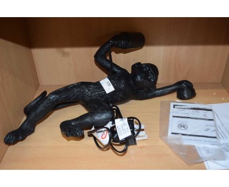 Kinfield one light wall fitting in the form of a monkey