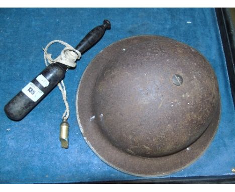 A War Helmet, together with a British Police Baton and Whistle (3).