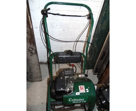 A Suffolk Punch Cylinder Petrol Motor Mower with scarifier and spare engine