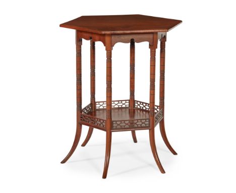 MANNER OF EDWARD WILLIAM GODWIN  AESTHETIC MOVEMENT MAHOGANY OCCASIONAL TABLE, CIRCA 1880   the octagonal top on six ring-tur