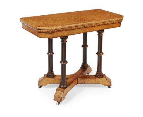 ATTRIBUTED TO CHARLES BEVAN  GOTHIC REVIVAL OAK FOLDOVER CARD TABLE, CIRCA 1870   the hinged rectangular top with carved lapp